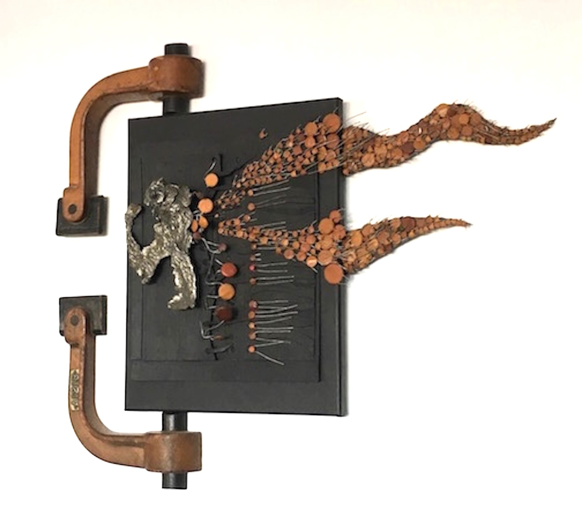 Hangers On - The concept of wanting  to remain a part of the whole. Plasma cut steel, electrodes,wood patterns, cast stainless steel, canvas. 14” x 14” x 1.5” 2015. (in a private collection)
