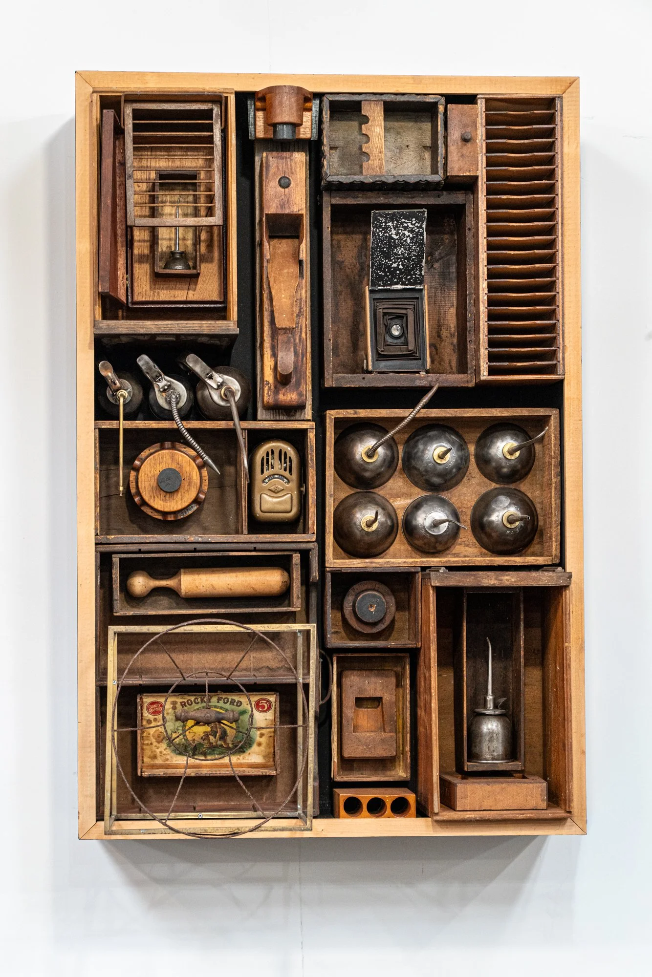 Thermal Distribution - Inspired by the numerous ways energy is consumed. Wood boxes, thermostat, oil cans, vintage camera, carpenter’s plane, cigar box, misc, wood items. 4.5’ x 3’ x 15”. 2014