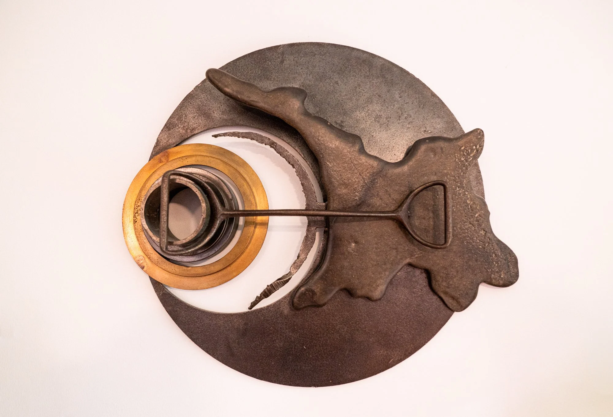 Celestial Glare - Inspired by the sun and moon's intense visual impact. Welded steel, brass, cast stainless steel. 1989