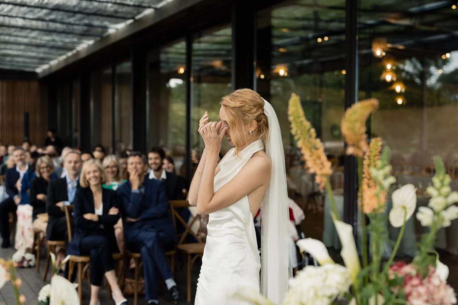 Emotional moment during the wedding ceremony at Chateau du Clair de Lune, Biarritz