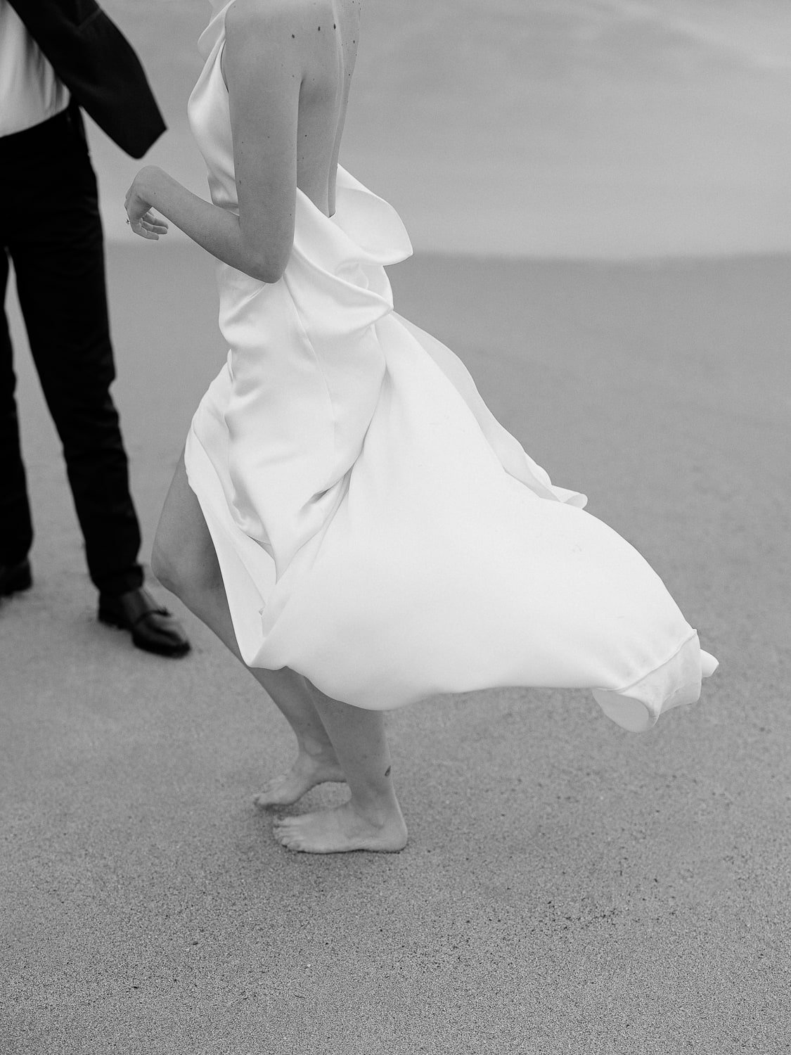 Scenic portrait of the newlyweds near the iconic Biarritz coastline, blending romance and sophistication.
