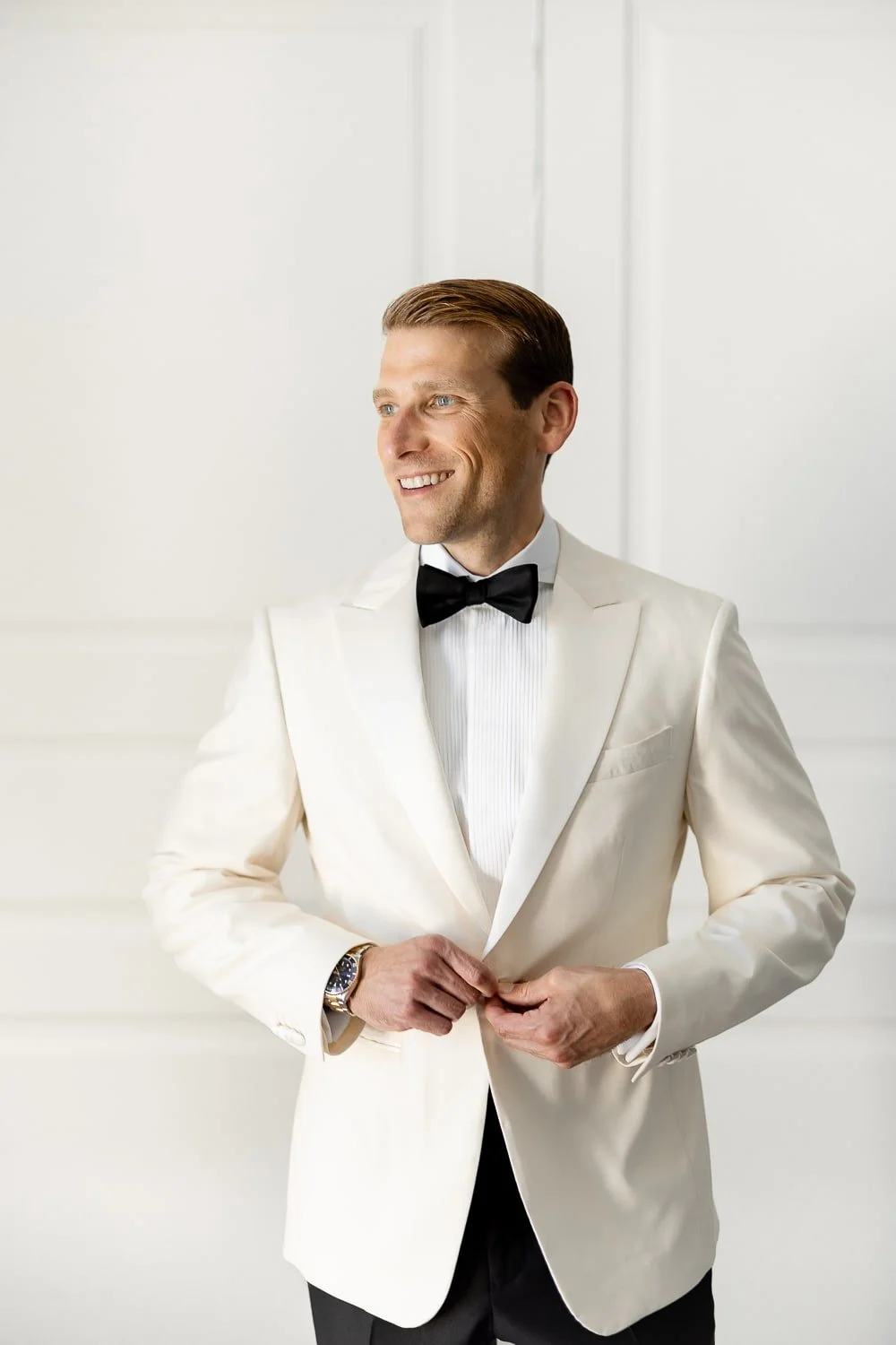 Editorial portrait of the groom at the beautiful Riviera Hotel