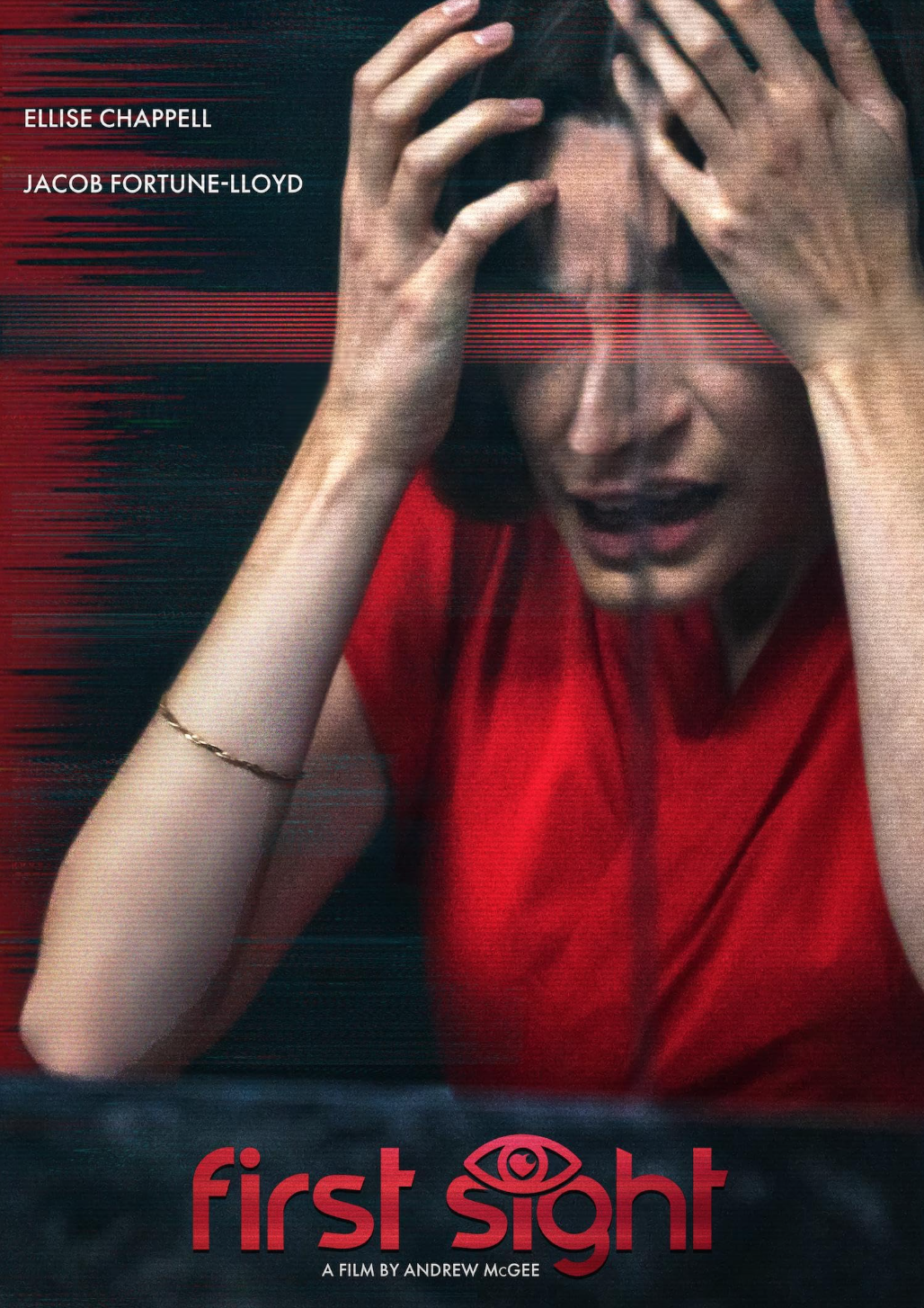 A woman with dark hair wearing a red shirt holds her head with both hands, appearing distressed. The image has a glitch effect and includes text with names 'Ellise Chappell' and 'Jacob Fortune-Lloyd' and the title 'First Sight' by Andrew McGee.