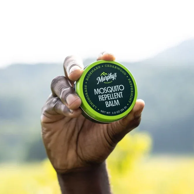 Balm-Tin-2oz_Valle-Crucis_Hand-Holding1_Horizontal_edited.webp