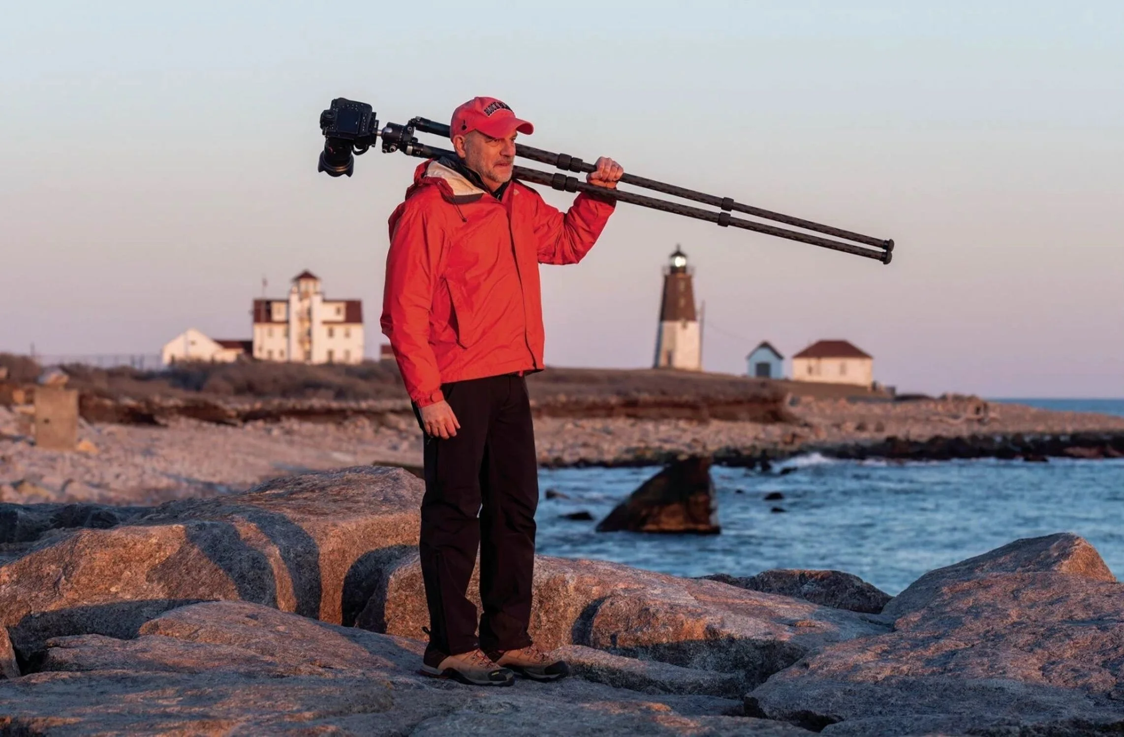Dave DeMarco with his photography equipment in a seemingly remote beach side in Rhode Island. (photographer Rhode Island)