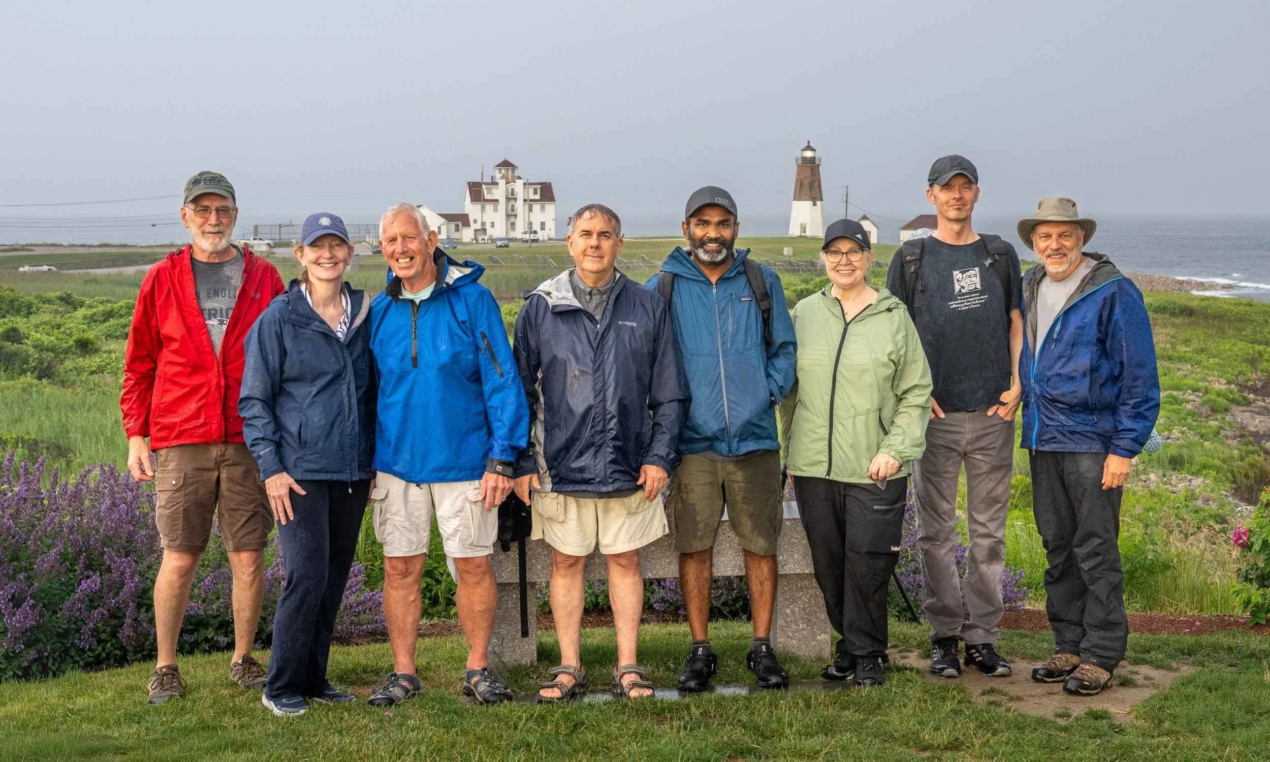 A group of photography learners with their instructor while on a field photography session.