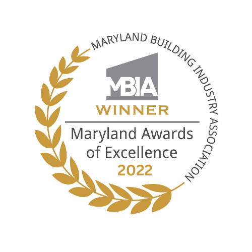 An award badge for the Maryland Awards of Excellence 2022, presented by the Maryland Building Industry Association, featuring a laurel wreath, the MBIA logo, and text indicating it is a winner.