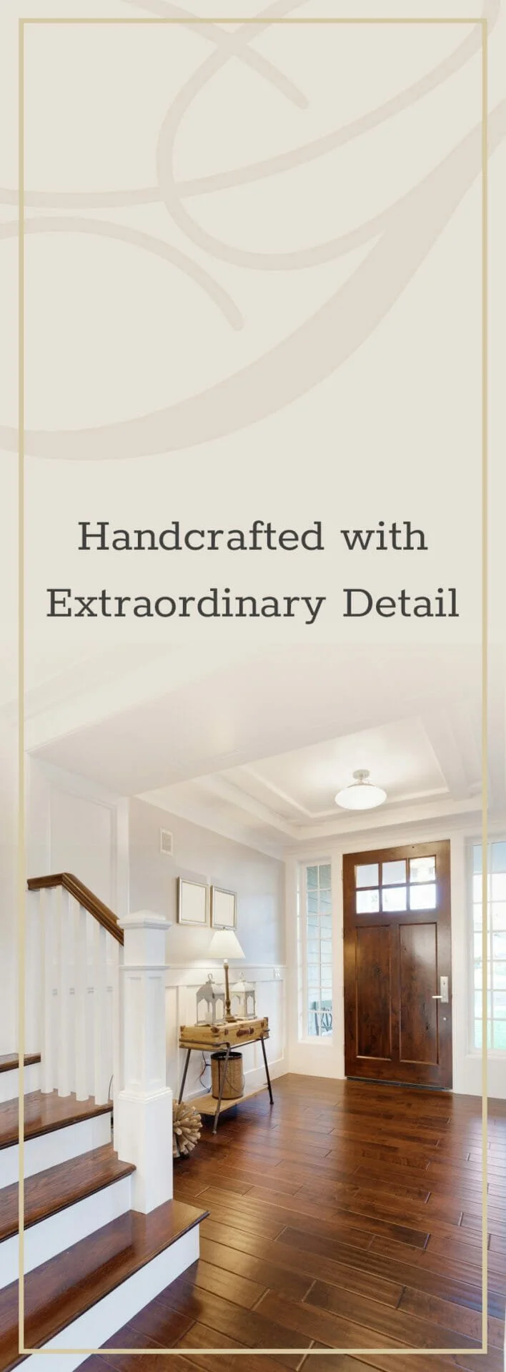 Elegant farmhouse entryway with medium wood front door, white walls, staircase with white balusters and dark wood steps, wooden console table, white table lamps, and framed wall art.