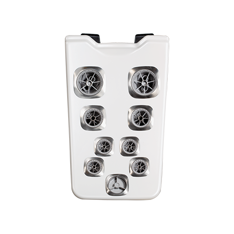 A white plastic device with multiple black and gray circular vents or nozzles arranged in a grid pattern.