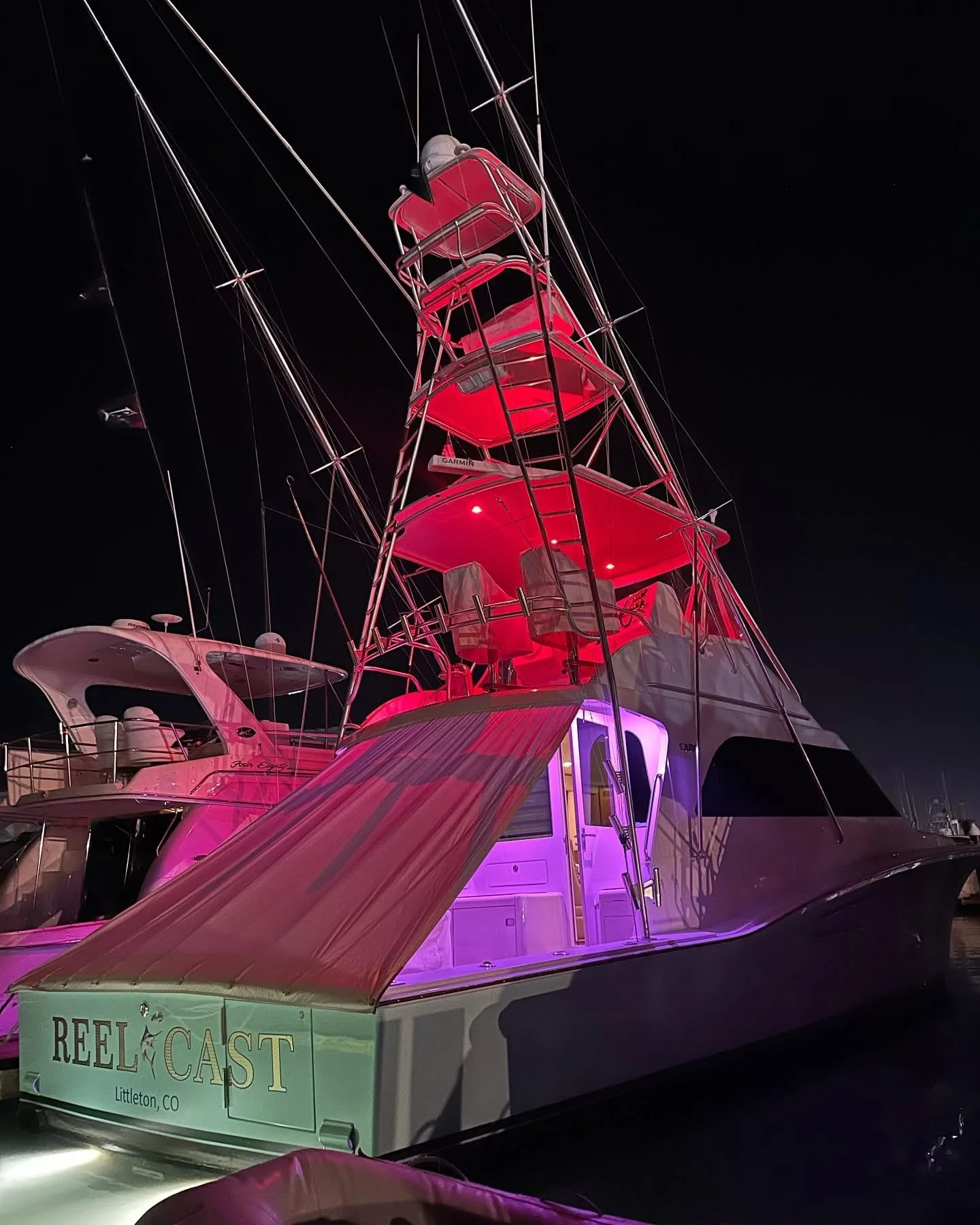 Night time view of the Reel Cast sport fishing boat docked in Cabo San Lucas
