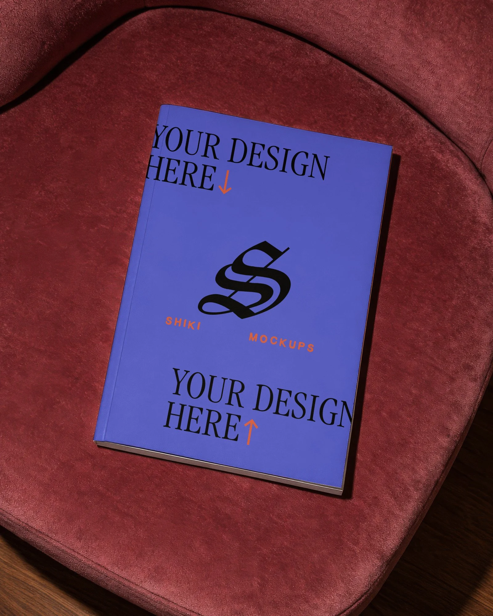 Magazine on Pink Velvet Chair