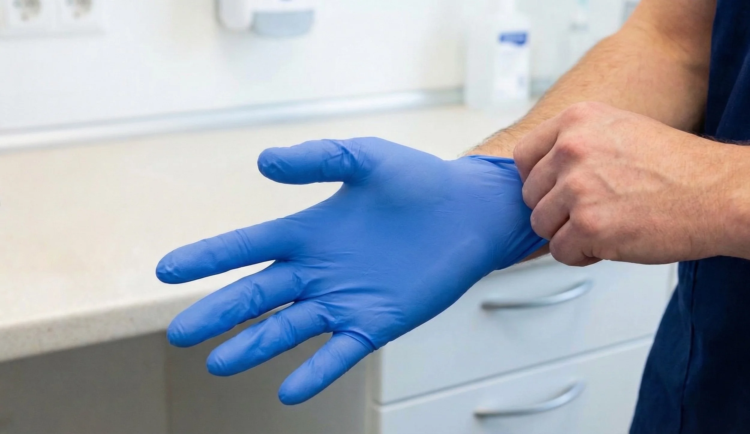Blue Tough As Shark Skin Nitrile Glove On Hand