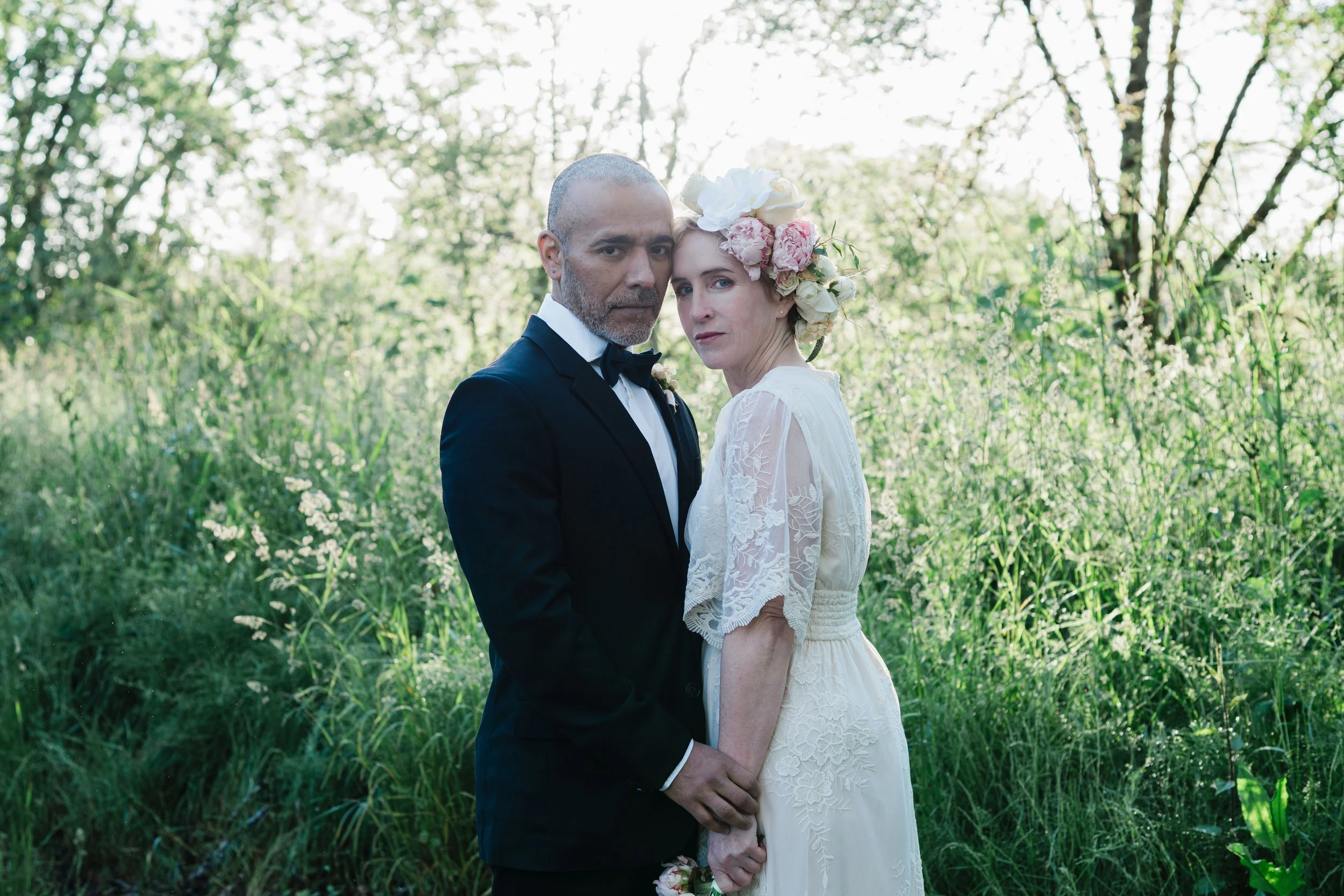 tacoma-wedding-photographer-bride-groom-meadow-portrait-sunlit-washington.jpg