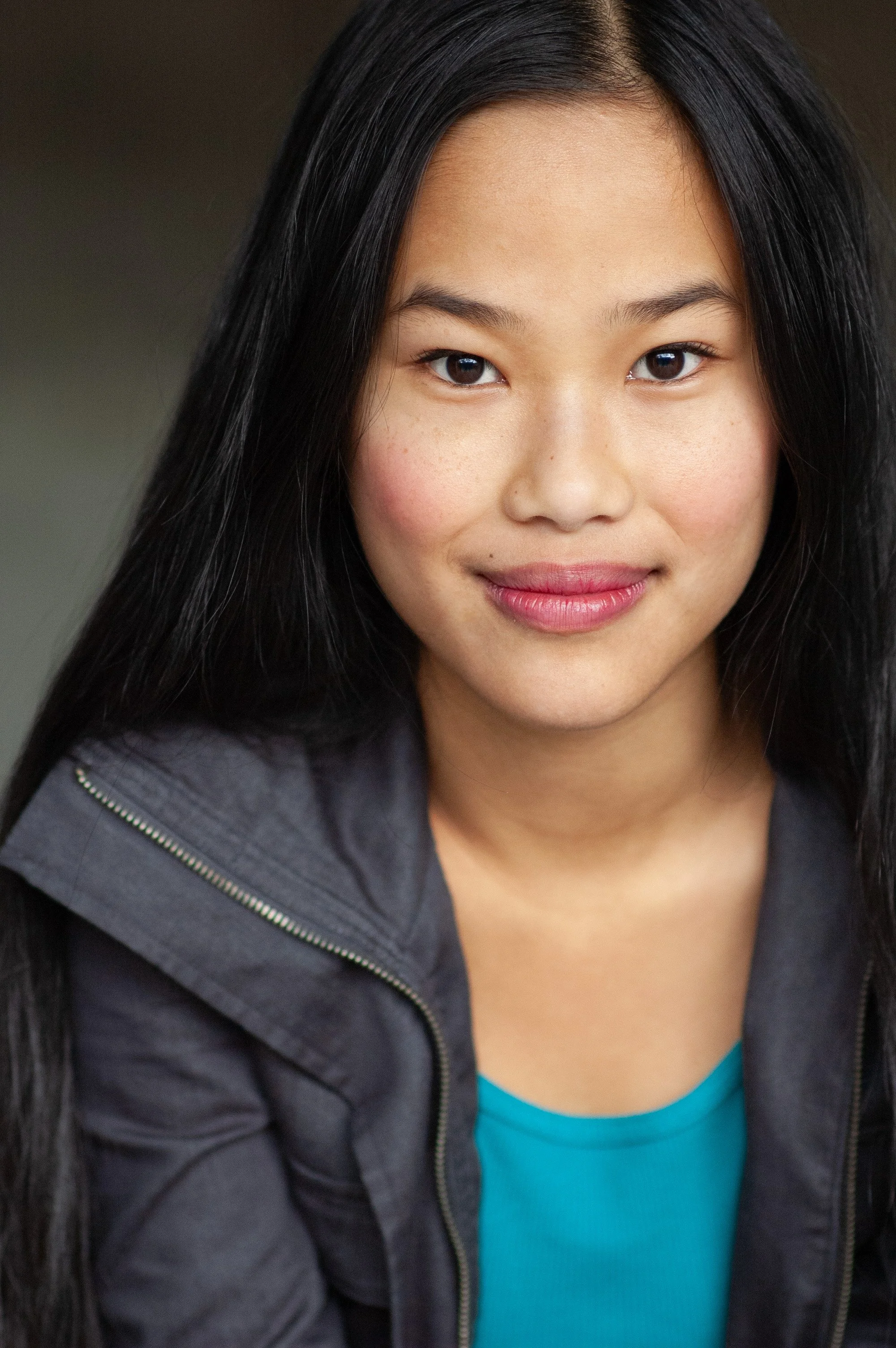 Lifestyle headshot of woman with natural expression and soft lighting in Tacoma Washington