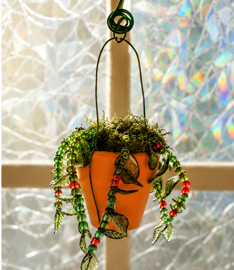 red plant suncatcher copy.png