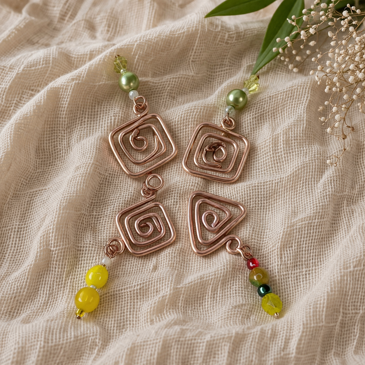 Handmade jewelry on linen fabric.png