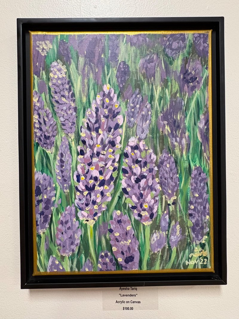 A painting of lavender flowers with purple and green colors, framed in black with a gold inner border.