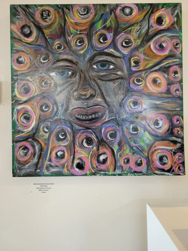 Painting of a distressed old man with blue eyes surrounded by numerous colorful eyeballs.