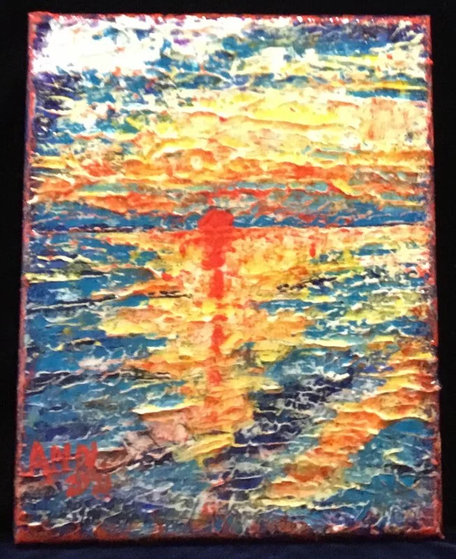 A colorful abstract painting depicting a sunset over water, with a red sailboat silhouette in the foreground and warm tones of orange, yellow, and red blending into cooler blue and purple hues.