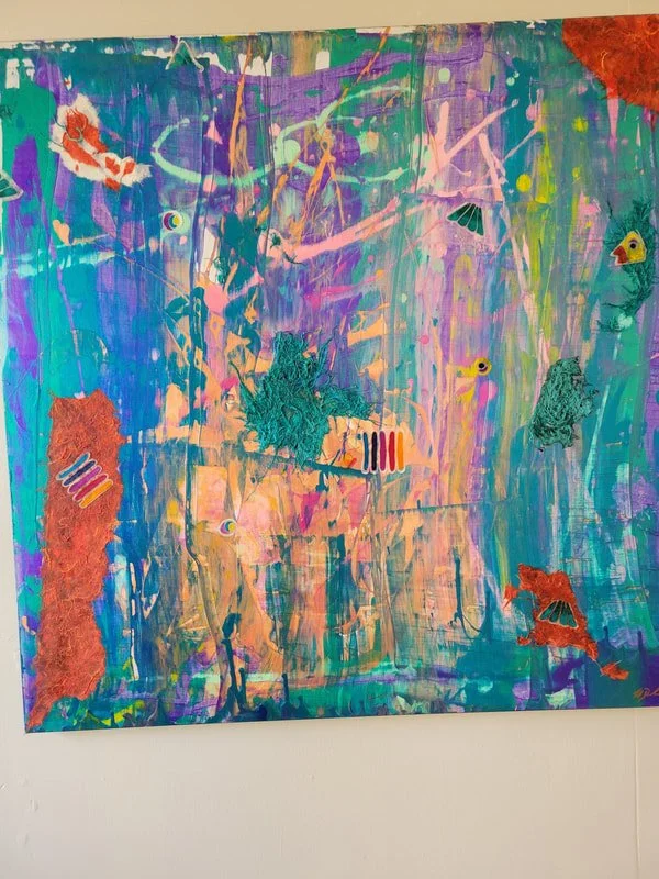 Colorful abstract painting with various animal shapes like birds and insects, including a green bird, a peacock, and a red-orange butterfly, on a vibrant background of pink, purple, blue, and green.
