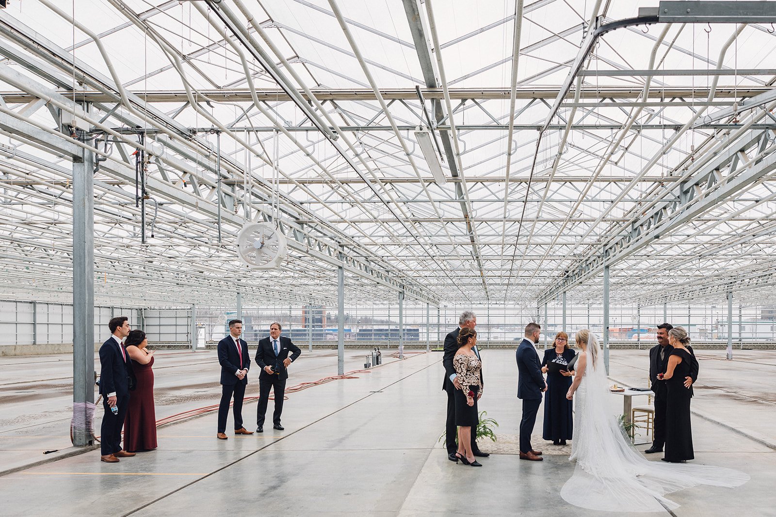 An intimate ceremony in the empty greenhouse at the Enjoy Centre