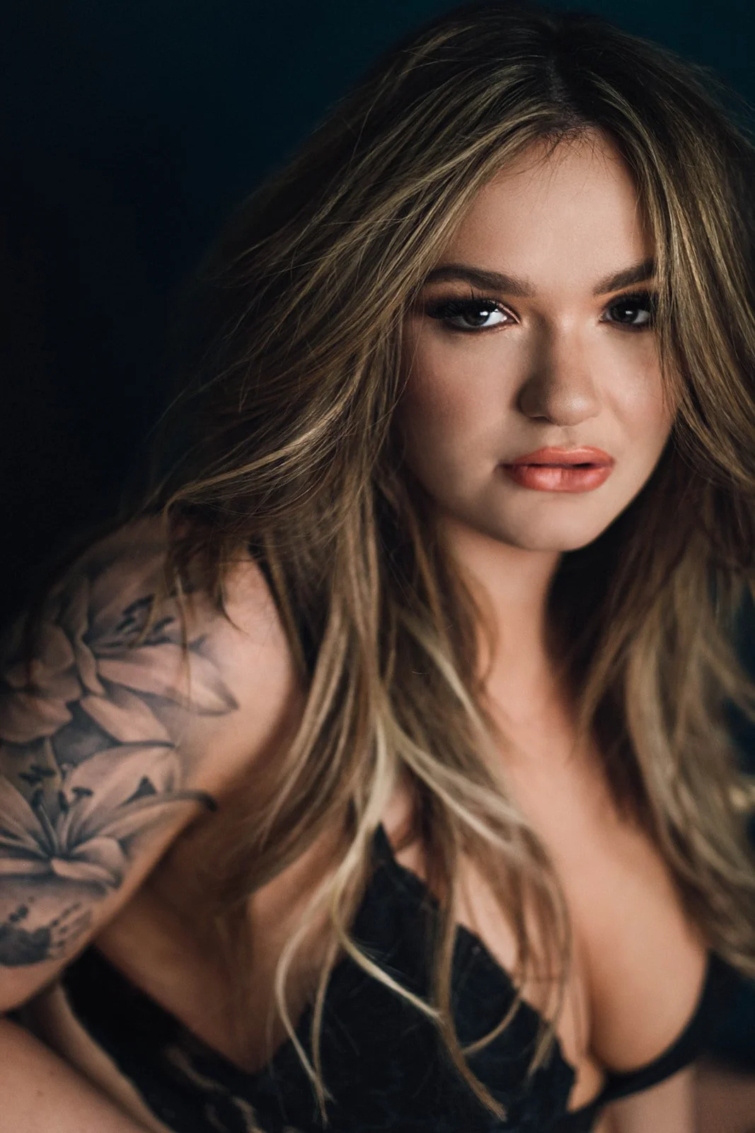 a close up portrait of a woman staring at the camera