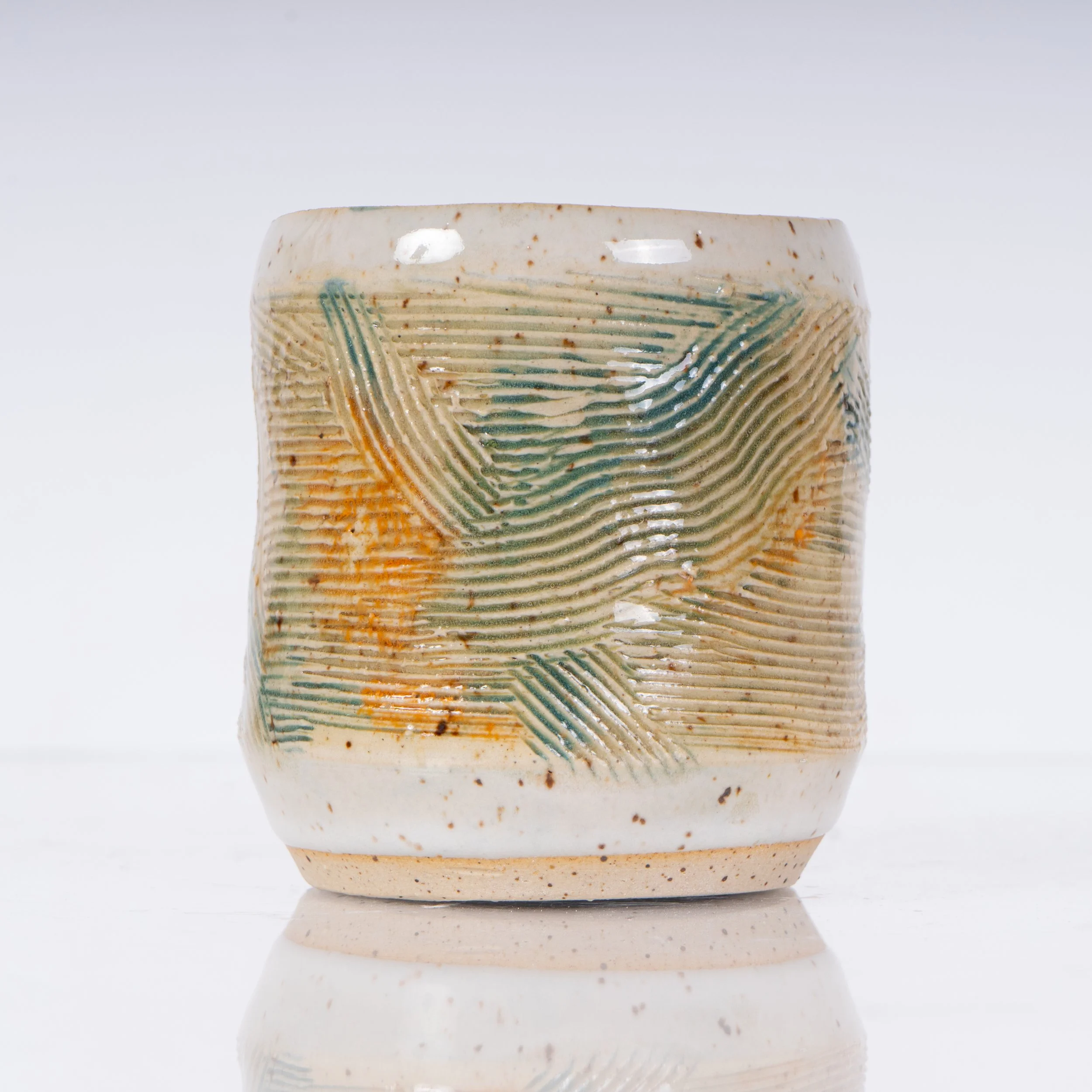 Textured Cup, March 2024

H- 3.5"
Stoneware 
Cone 6 electric