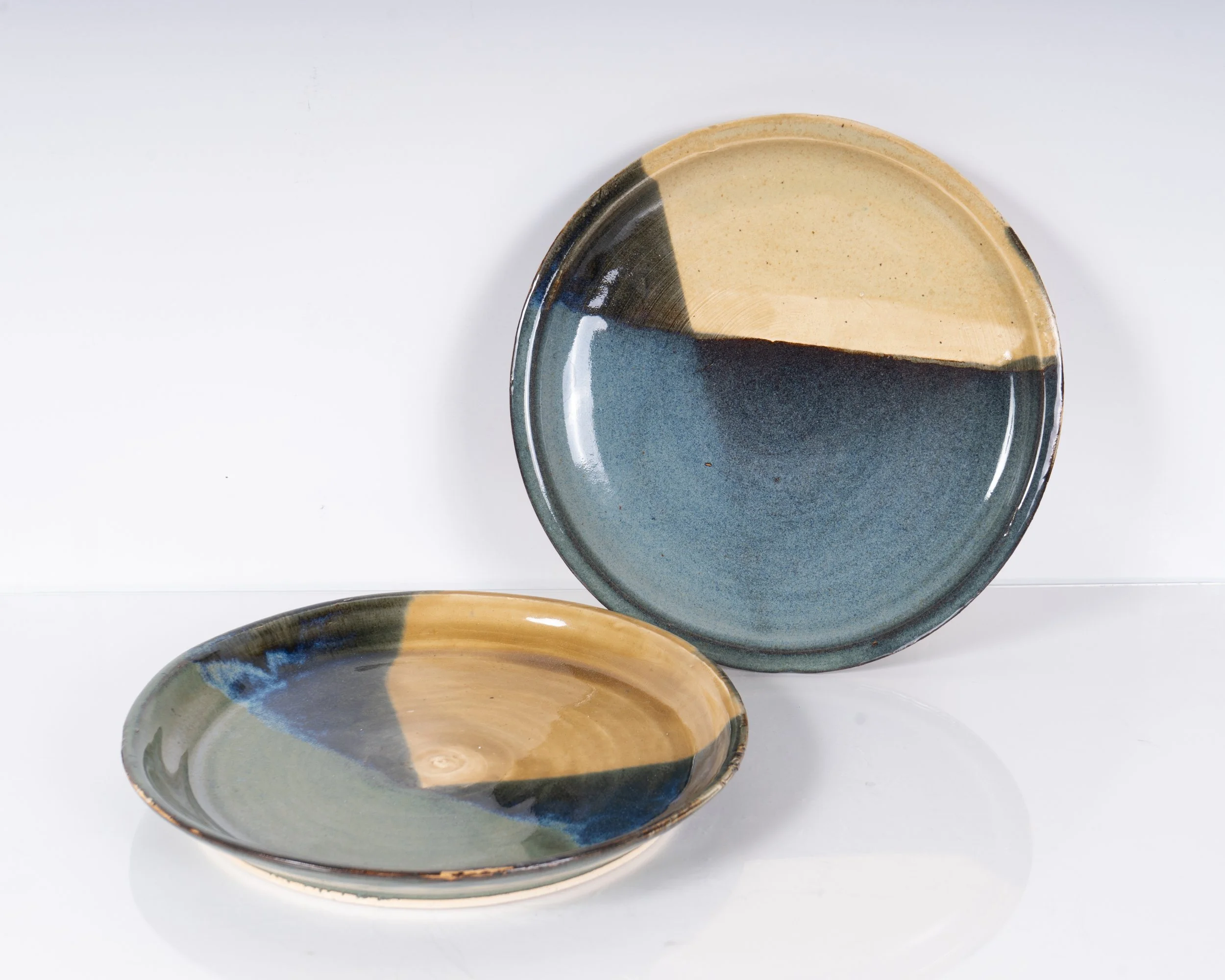 Plates May 2025
9.5"x9.5"x2"
Stoneware 
Cone 6 electric