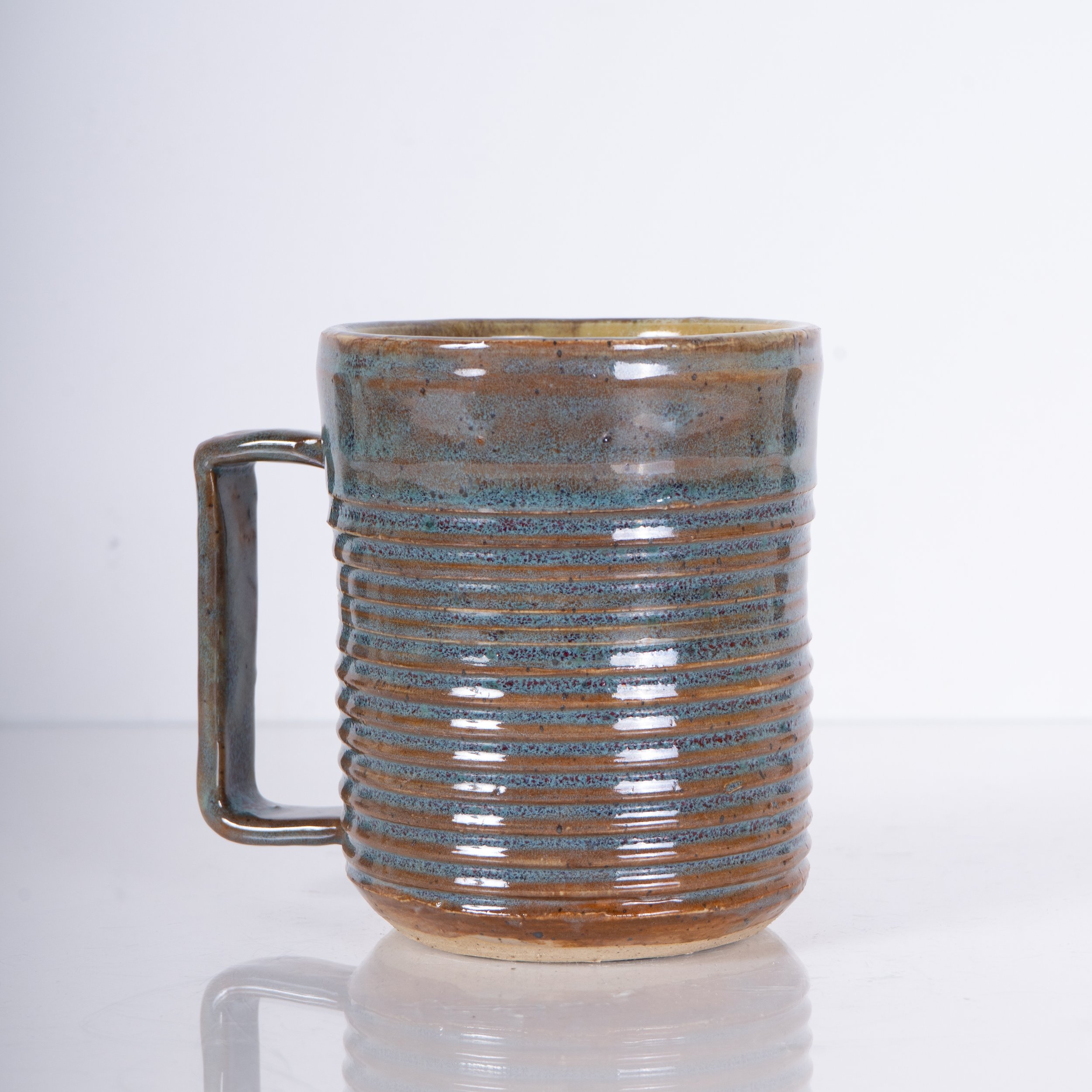 Textured Mug, November 2024
H- 5"
Stoneware 
Cone 7 Reduction