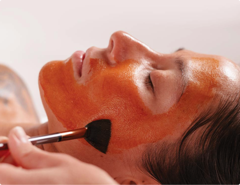 Ultra Medi-Infusion facial with mask application, designed to boost radiance, enhance absorption of active ingredients, and improve skin clarity and texture for a glowing complexion.