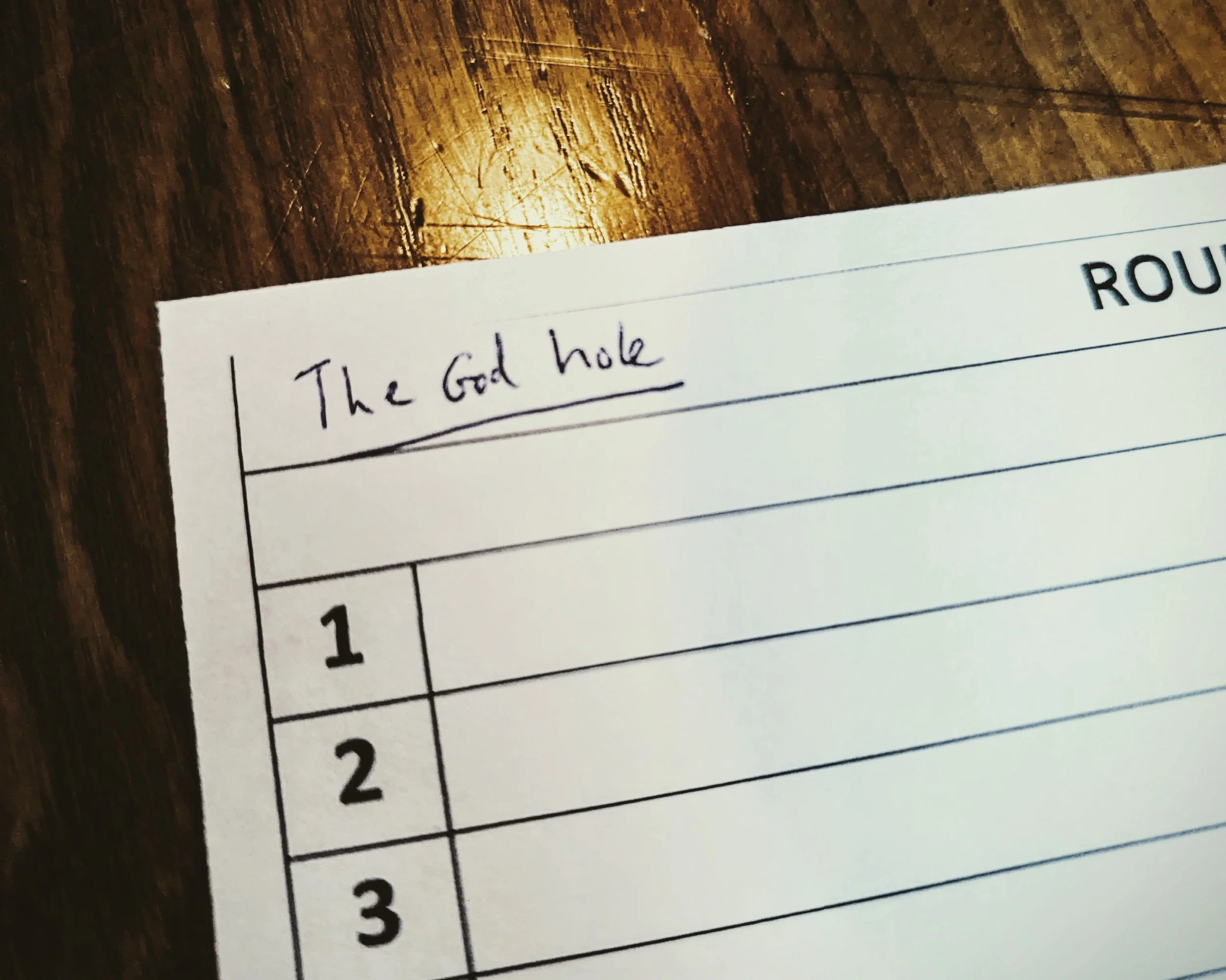A pub quiz sheet with team name 'the God hole'