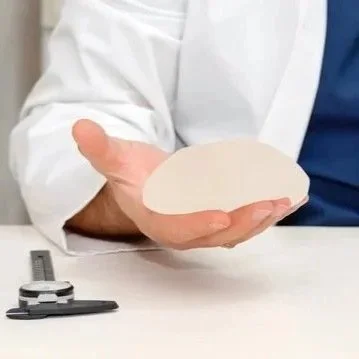 Should I Have My Breast Implants Removed?