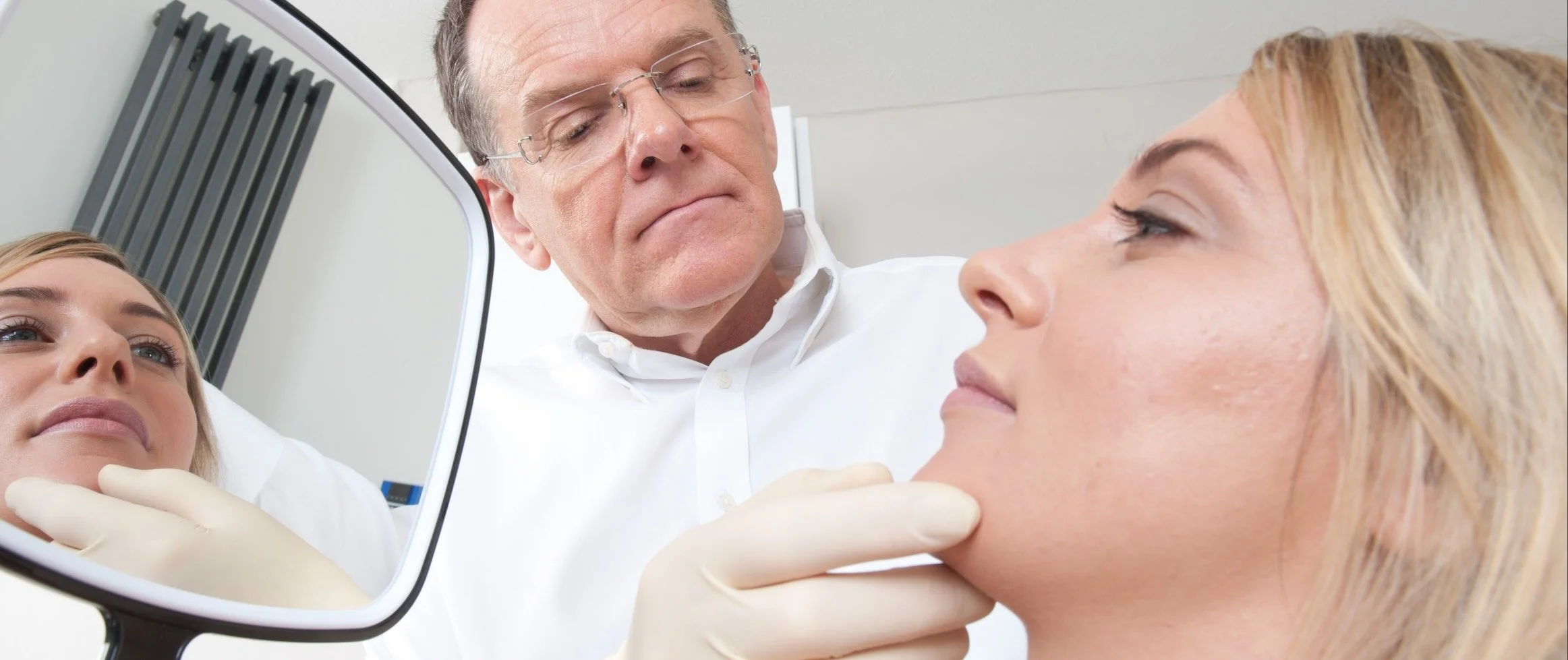 Expert doctor consultation with woman about aesthetic treatments