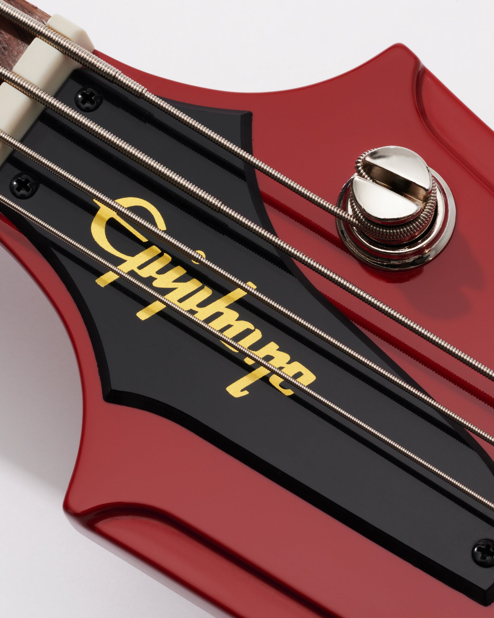 epiphone thunderbird t-bird bass guitar headstock truss rod cover daniel boyd commercial product photography  