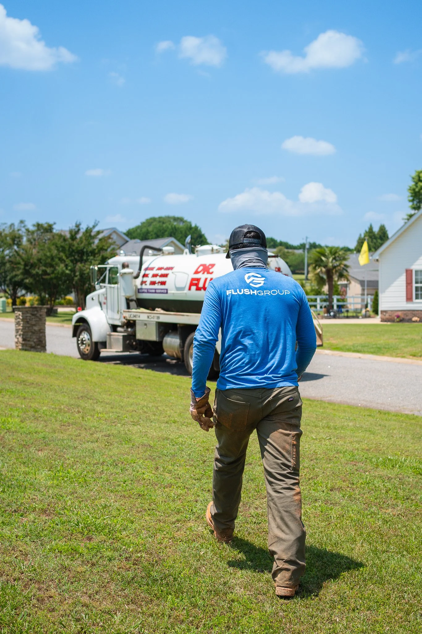 Dr. Flush technician preparing for new septic system installation at residential property in South Carolina