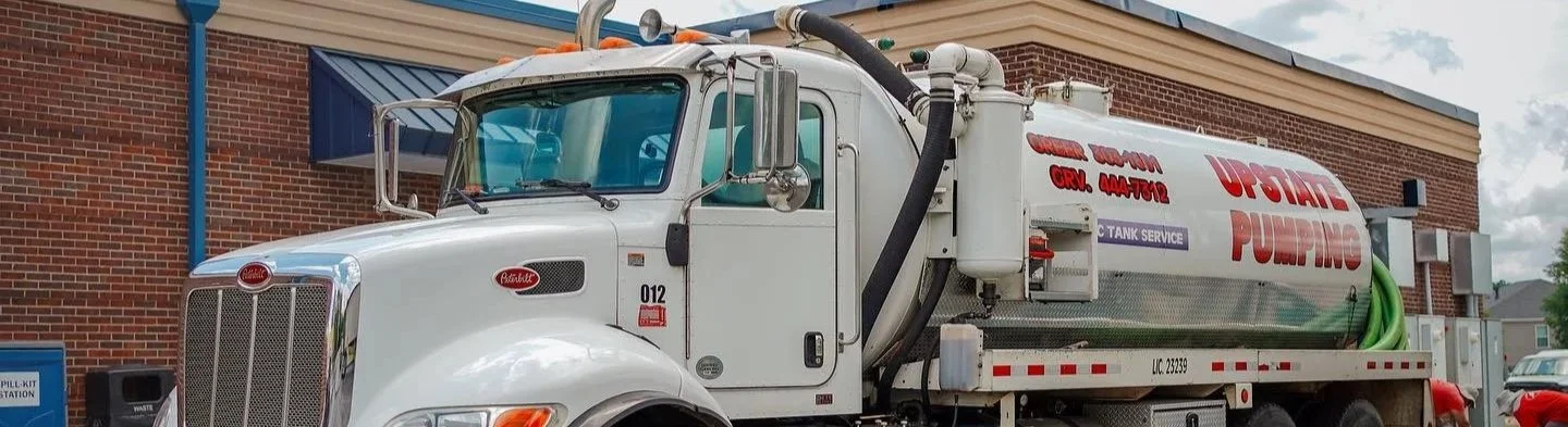 Upstate Septic Tank pumping truck parked outside service location in South Carolina
