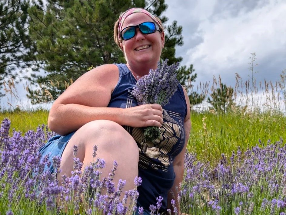 A woman in a field of lavender