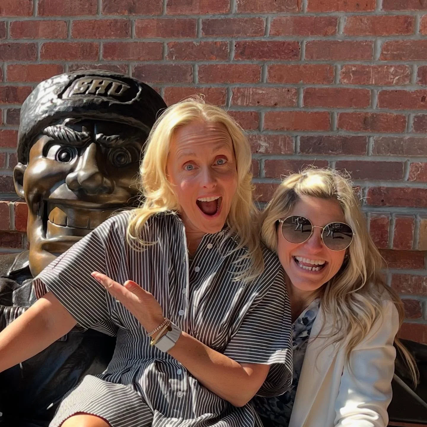 Yes...I'm sitting on the lap of a giant @sacredheartuniversity mascot statue...but that's not really the point of the post...it's this...

Meet Ashley Freeman...

👉An incredible woman I get to work with and couldn't be more proud of 💥

👉Executive 