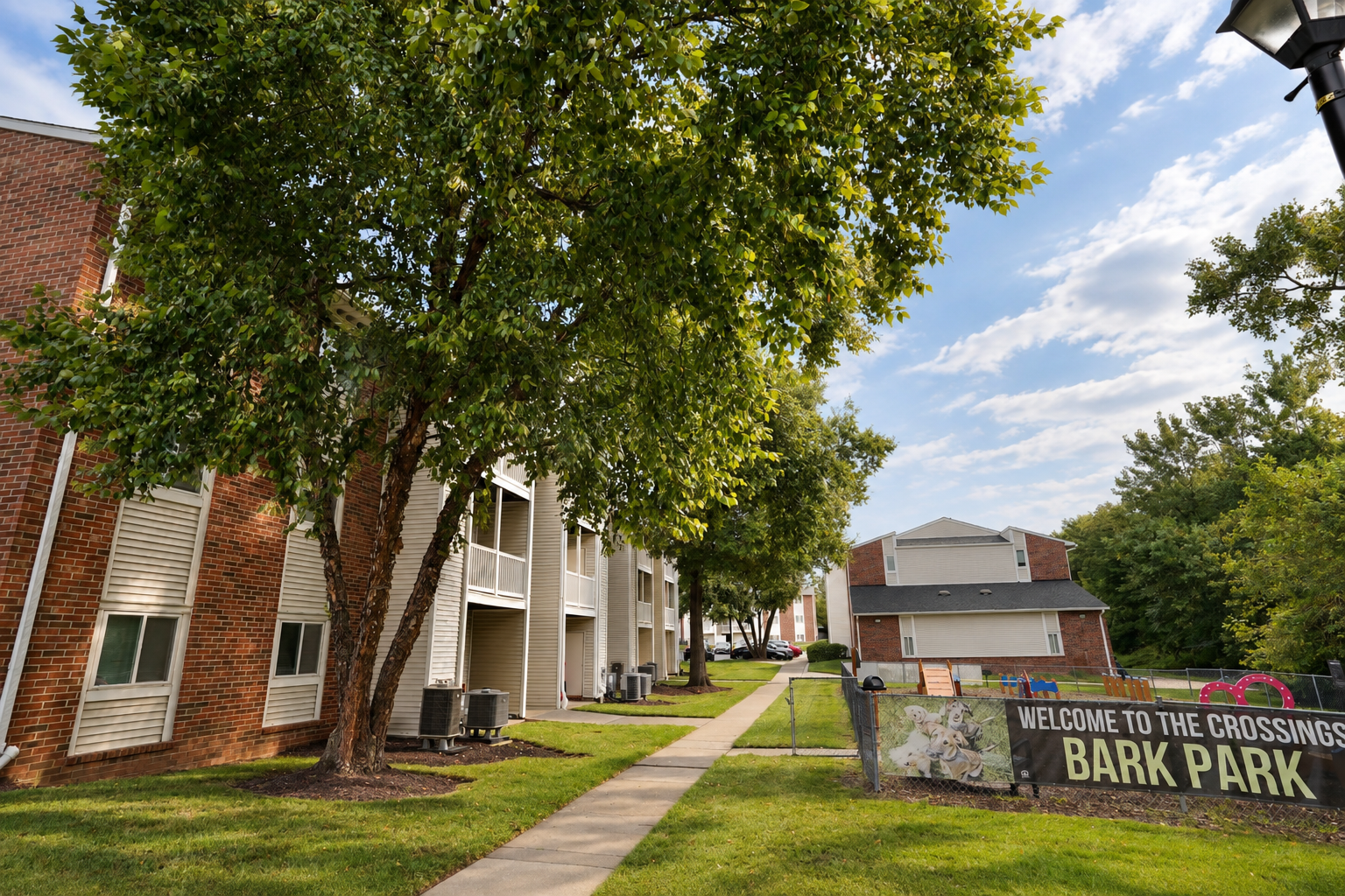 Apartment buildings and landscaped grounds at Crossings at White Marsh