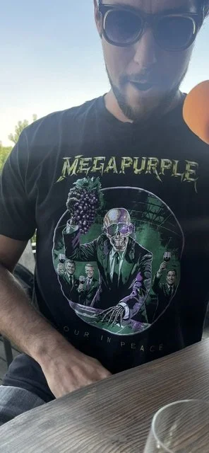 Man wearing t-shirt that says "MegaPurple"