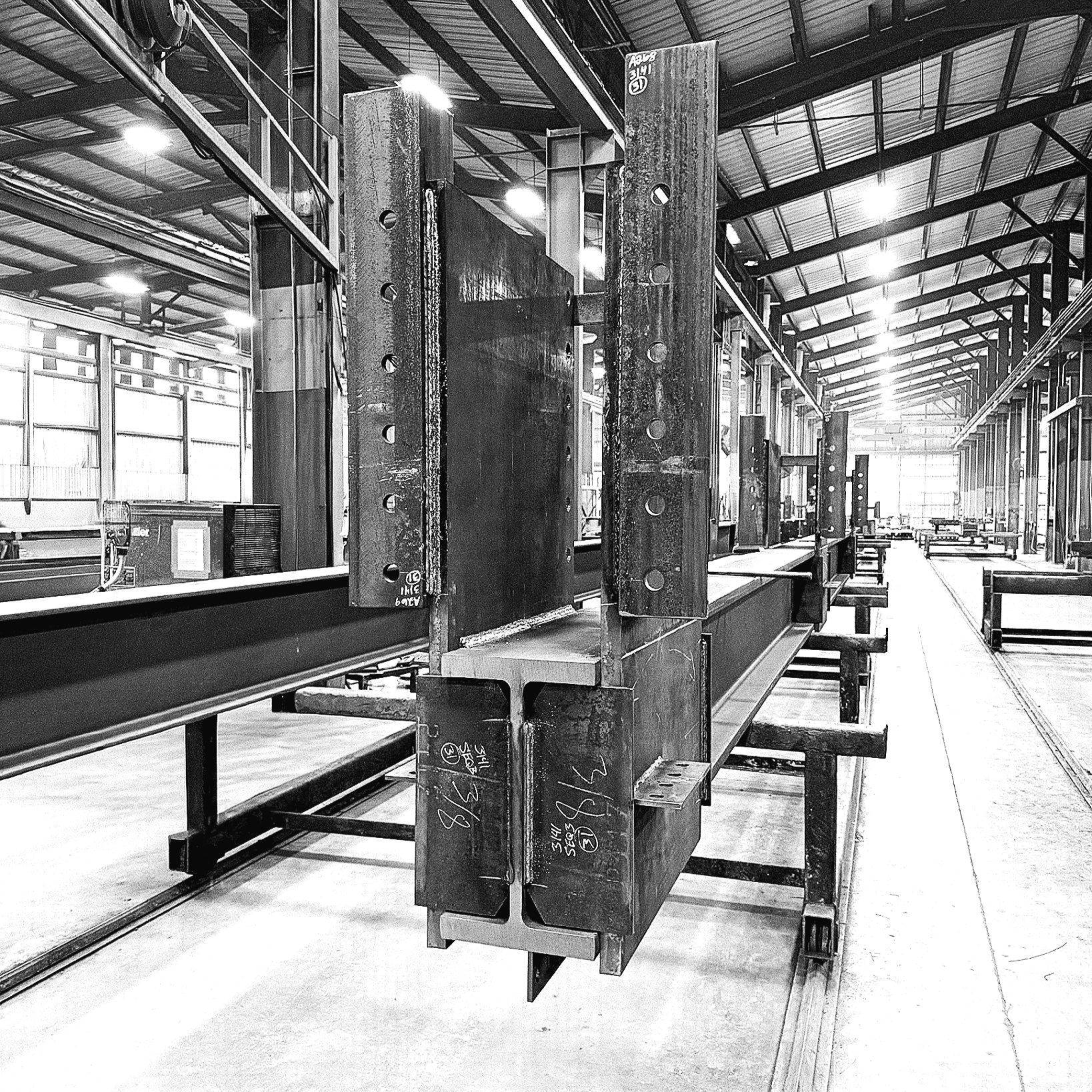 Steel beams and structural components in an industrial warehouse.