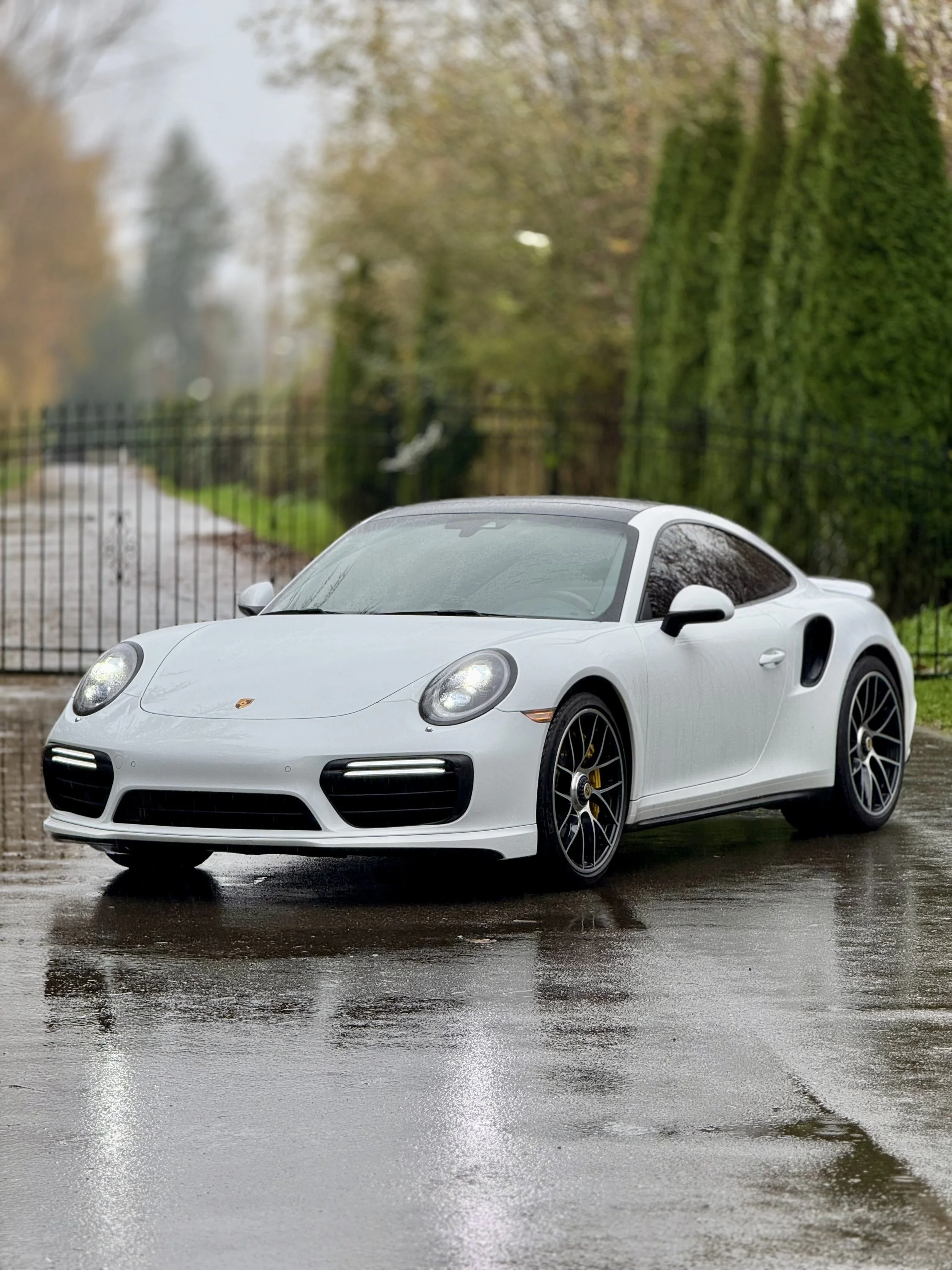 White Porsche with scenic background