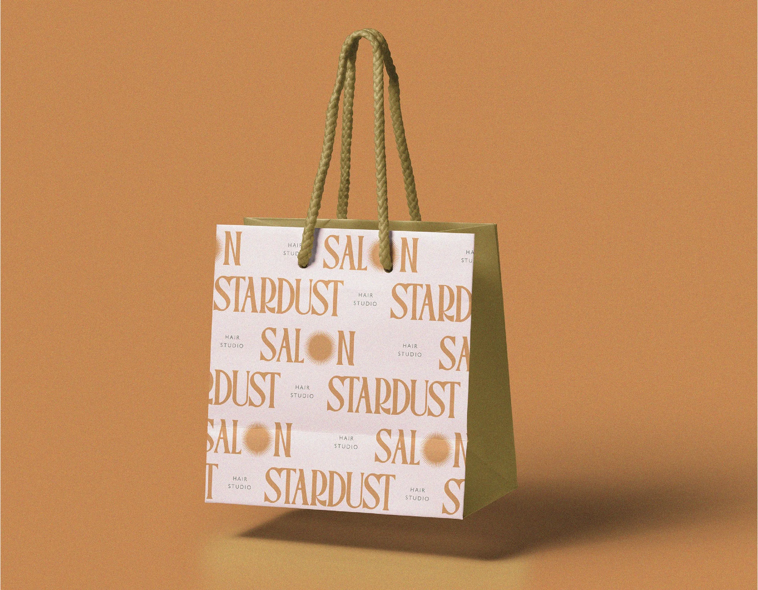 gift bag with stardust salon logo