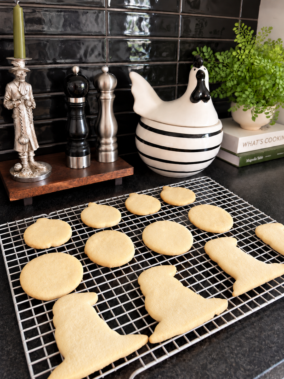 Pale-edged witch-hat cookies cooling.png