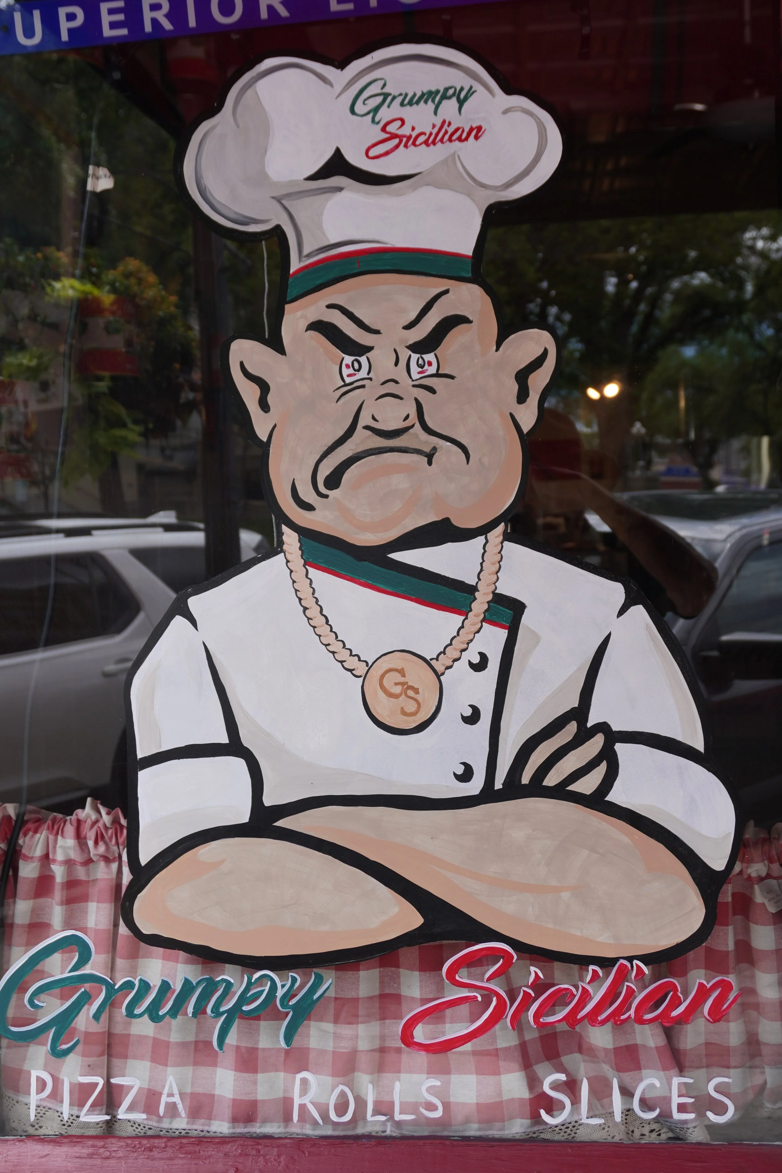 Grumpy Sicilian pizza shop mural on Whiskey Row, Prescott Arizona"