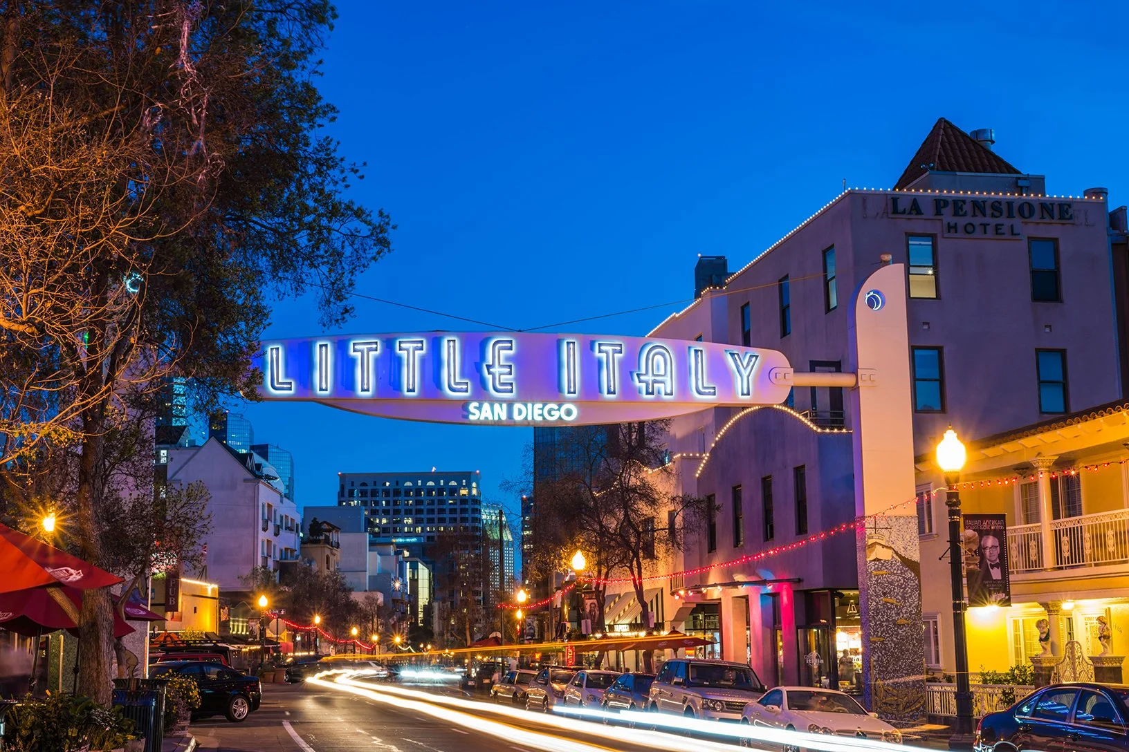 Little Italy neon sign and street at dusk, San Diego