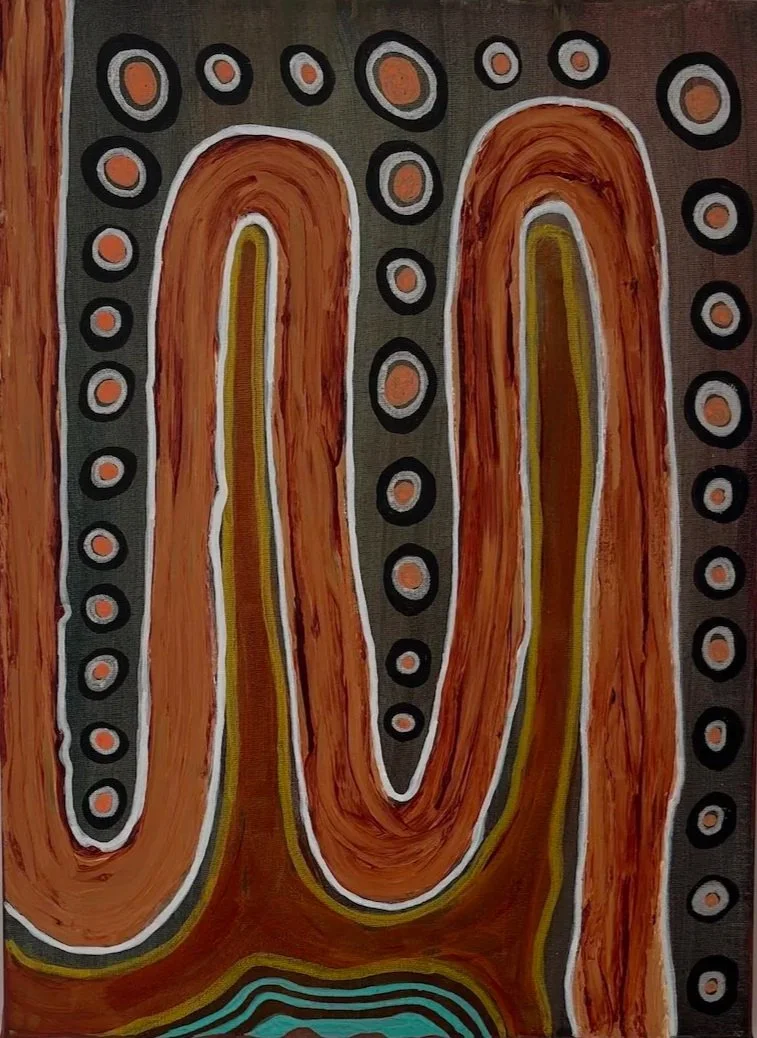 Aboriginal painting with large orange, yellow, and black loops surrounded by smaller orange dots with black outlines on a dark background.