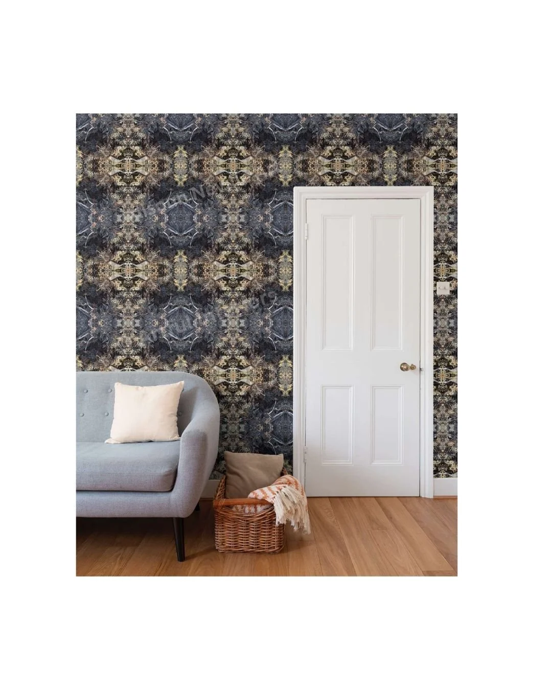 Deep Current wallpaper repeat by Artful Weave in a living room — abstract seaweed and algal forms in deep blue, charcoal and gold covering the full wall behind a grey sofa and white door.