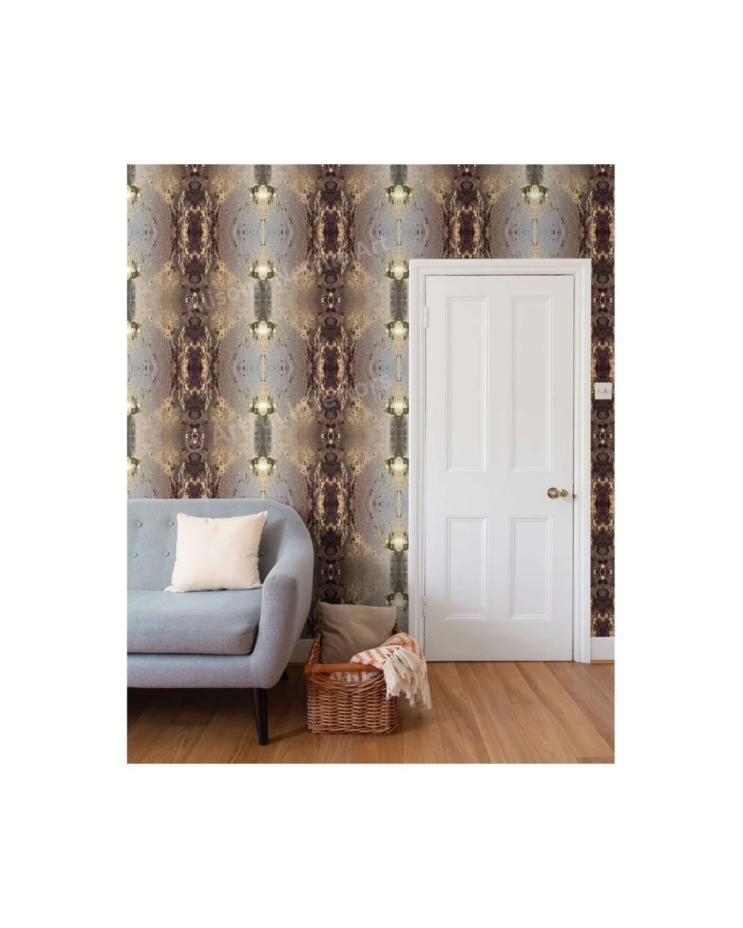 Lustre wallpaper repeat by Artful Weave in a living room — abstract organic forms in gold, deep plum and silver-grey covering the full wall behind a grey sofa and white door.