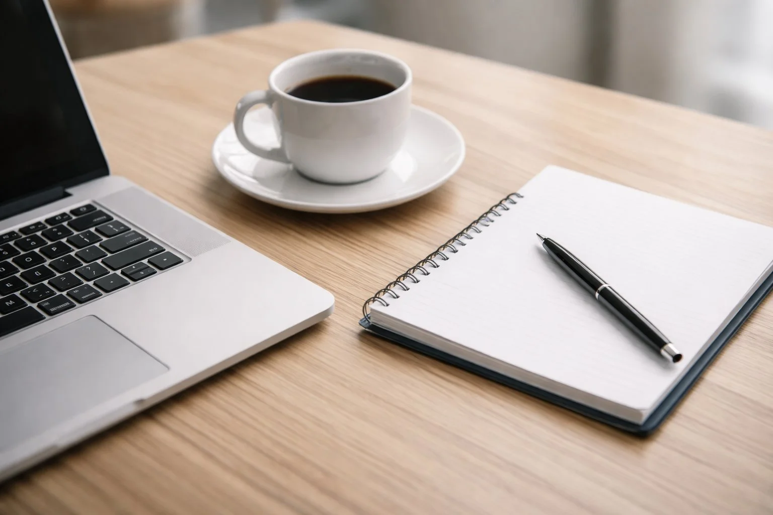 Lawyer workspace with laptop and legal notebook